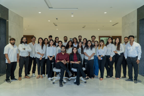 The full SpazioLiv team in the office lobby