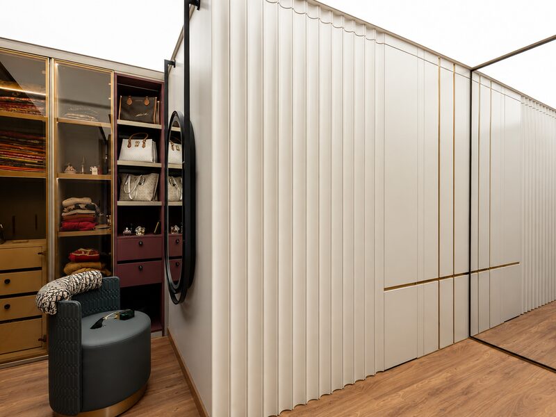 Walk-in dressing room with organised wardrobes